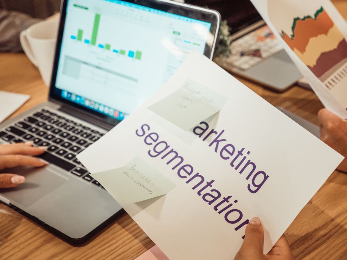 A laptop and a marketing segmentation plan